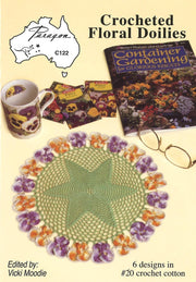 A photoshoot of Book C122 - Crocheted Floral Doilies on a white background